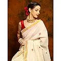 Off White Onam Saree with Golden Border and Traditional Sequined